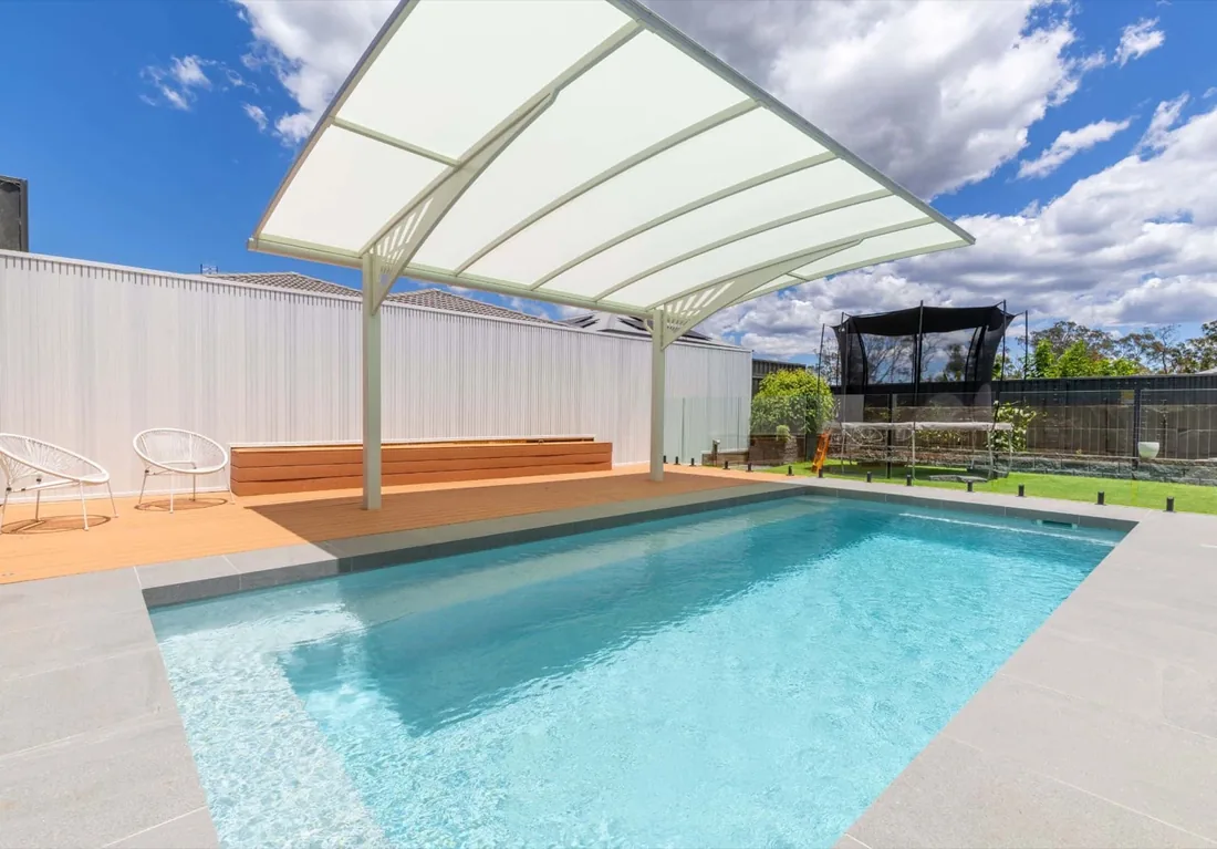 A Entertainer 7 fibreglass pool in Quartz Grey