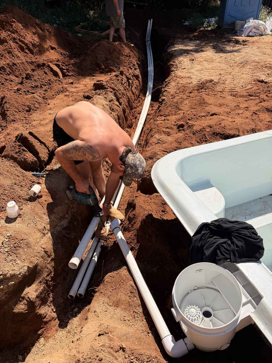 Plumbing being glued up at the shell wall, Mission Beach