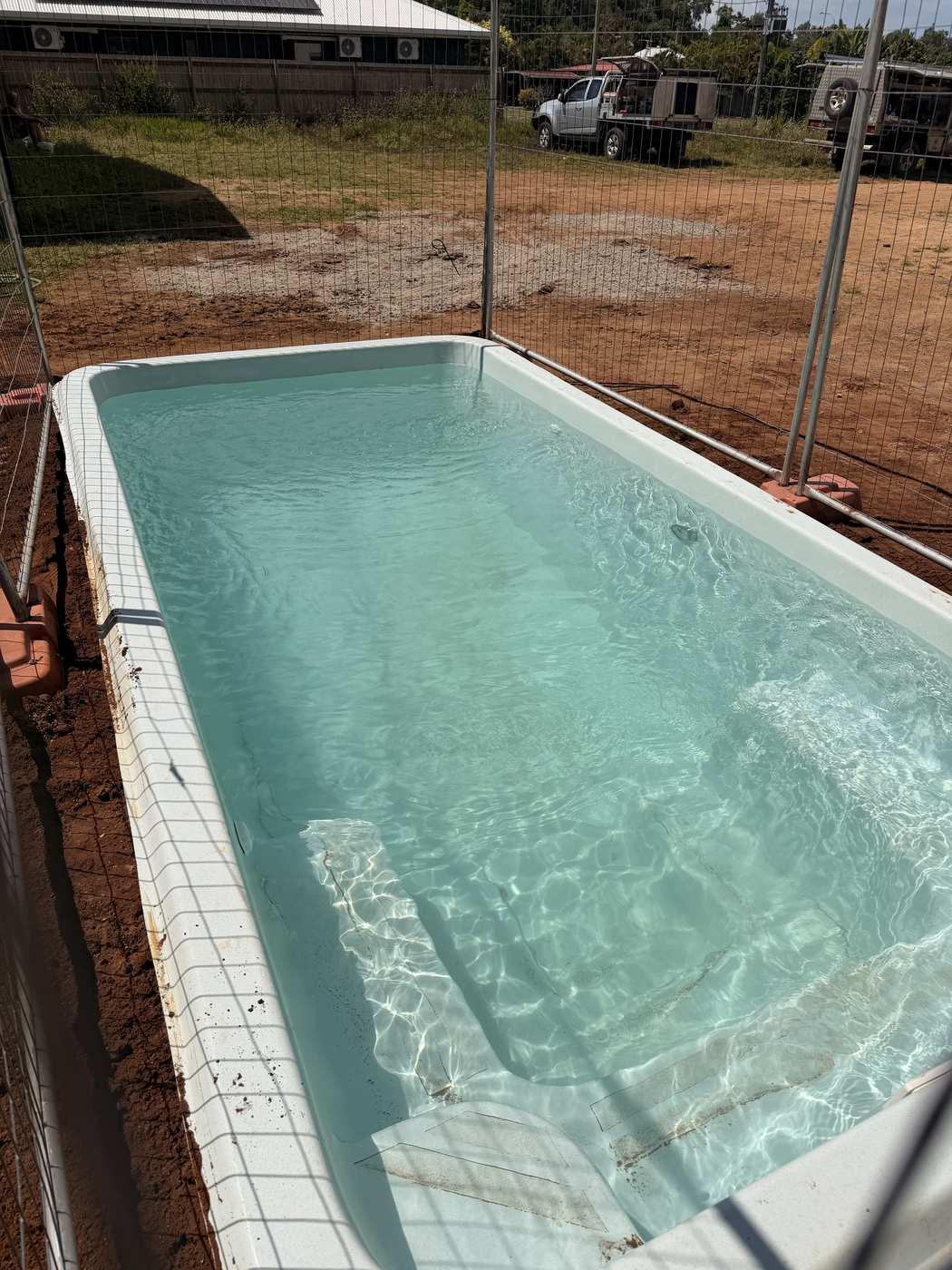 Finished fibreglass pool full of water at Mission Beach, day three